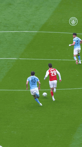 Soccer Players On A Field With One Wearing The Number 33 GIF