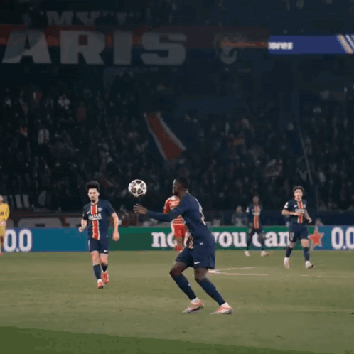 Soccer Players On A Field With The Number 25 In The Background GIF