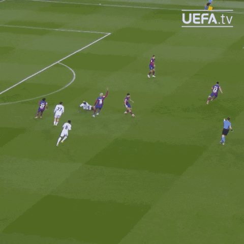 Soccer Players On A Field With Uefa.tv In The Corner GIF