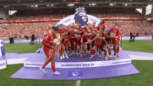 Soccer Players on Champions Podium