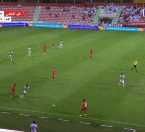 Soccer Players on Field with Admoc Pro League Ads