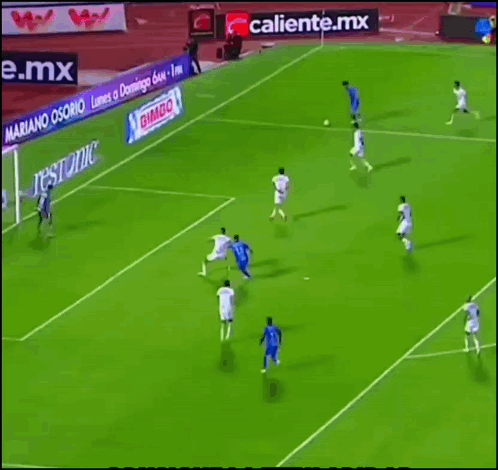 Soccer Players on Field with Bimbo Ad