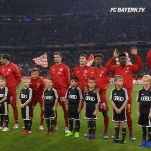 Soccer Players on Field with FC Bayern.tv Logo