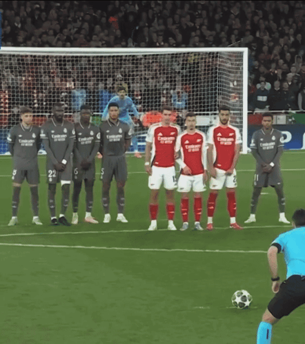 Soccer Players On Field With Fly Emirates Jersey GIF
