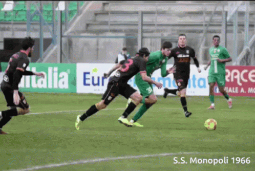 Soccer Players On Field With Italia Sign GIF