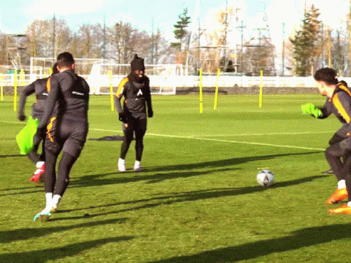 Soccer Players On Field With Letter A Jersey GIF