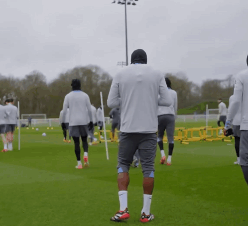 Soccer Players on Field with Nike Shirt