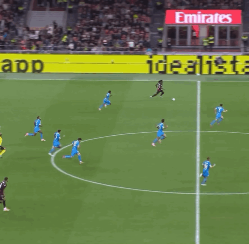 Soccer Players on Field With Puma Go Wild Ads