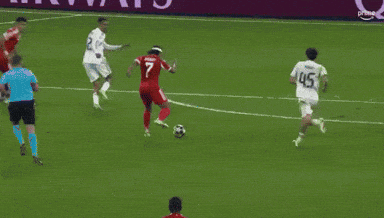 Soccer Players On Field With Qatar Banner GIF