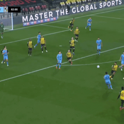 Soccer Players on Field With Ucfb Giz Ads