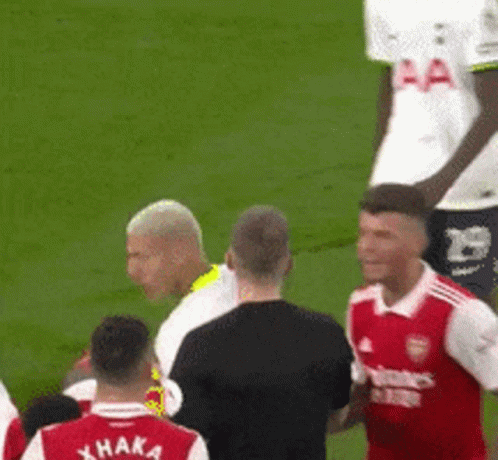 Soccer Players on Field with Xhaka Shirt