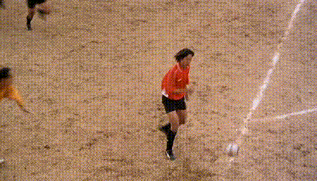 Soccer Players One in Red Shirt