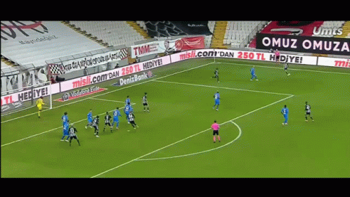 Soccer Players Playing Field With Misik.com Denizbank Ads