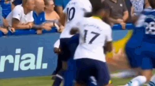 Soccer Players Playing Game With Crowd