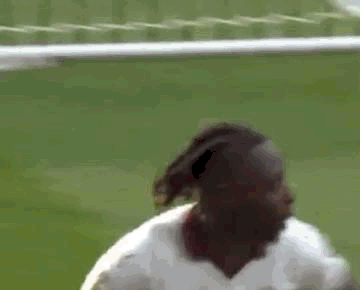 Soccer Players Playing Match