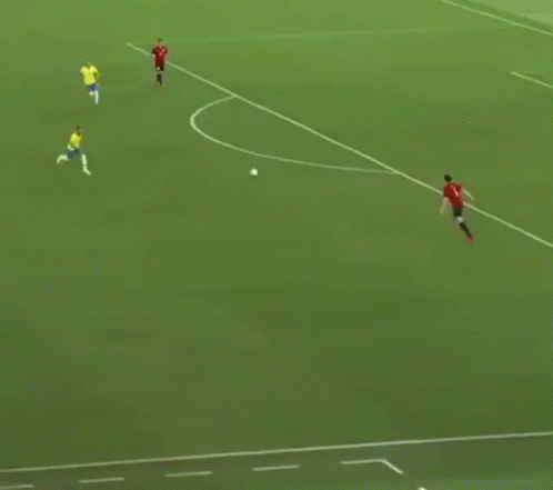 Soccer Players Playing on Field