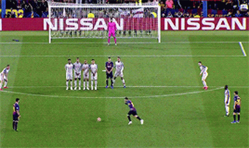 Soccer Players Playing with Nissan Banner