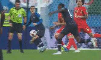 Soccer Players Playing With Referee
