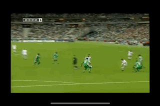 Soccer Players Playing With TCM Scoreboard GIF