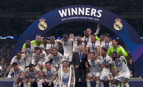 Soccer Players Posing for Winners Sign