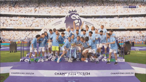 Soccer Players Posing With Champions 2022/24 Trophy
