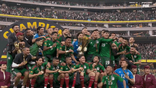 Soccer Players Posing With Fox Live Advertisement
