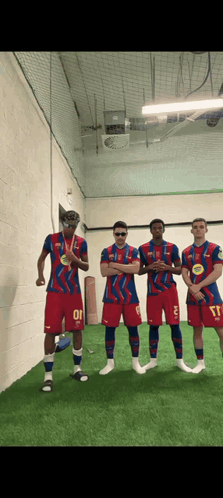 Soccer Players Posing With Number 10 Shirt