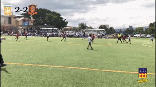 Soccer Players Score 2-2 GIF