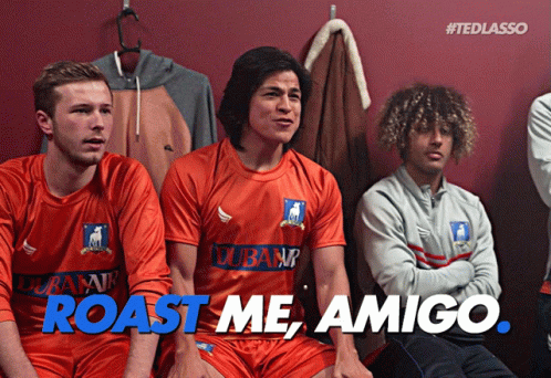 Soccer Players Sitting in Locker Room