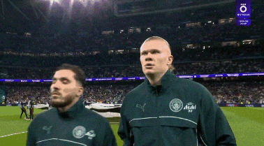 Soccer Players Standing on Field