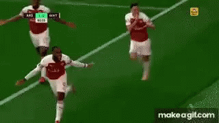 Soccer Players Standing on Field