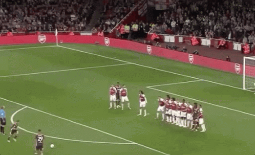 Soccer Players Standing With Arsenal Banner GIF