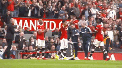 Soccer Players with Man Utd Banner