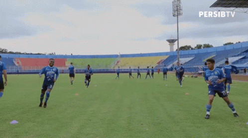 Soccer Players With Persibtv Logo