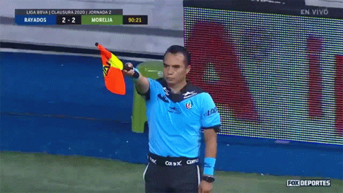 Soccer Referee Holding Yellow Flag Saying Adi
