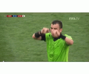 Soccer Referee in Green Shirt