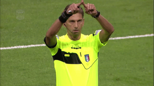 Soccer Referee In Yellow Shirt With Letter I GIF