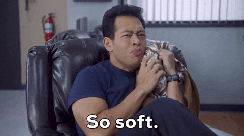 Man Holding A Soft Blanket GIF