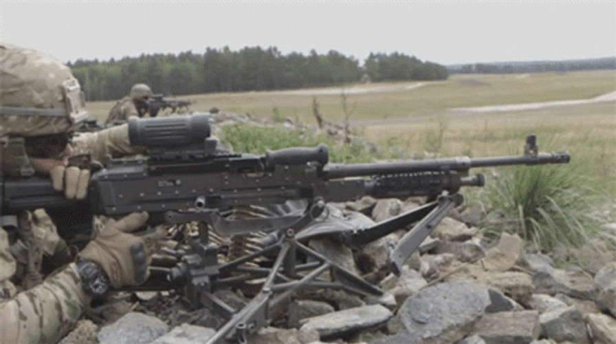 Soldier Firing The Machine Gun GIF