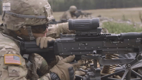 Soldier in AP26 Helmet Holding Machine Gun