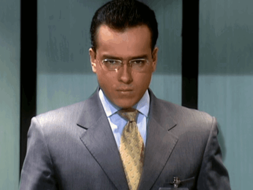 Soldier In Camouflage In Lush Green Forest GIF