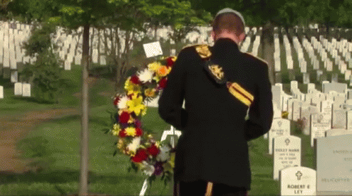 Soldier Laying Wreath at Robert E Let Grave