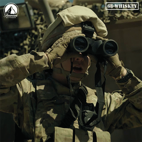 Soldier Looking Through Binoculars With Paramount Network Logo