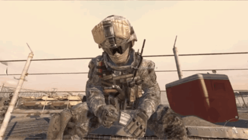 Soldier Next to Red Cooler Saying Military