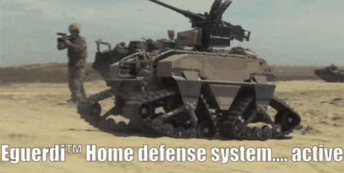 Soldier Next to Tank Saying Eguerdi Home Defense System Active