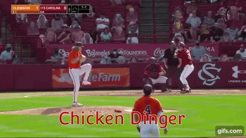 Soldiers Dancing In Dirt Near Water Bottles GIF