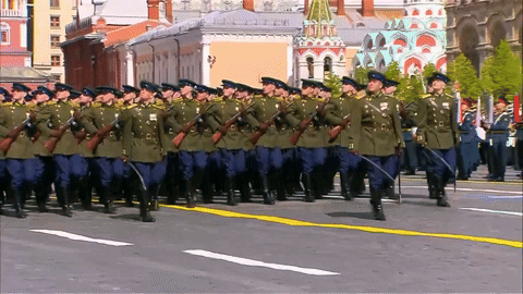 Soldiers Marching Down Street