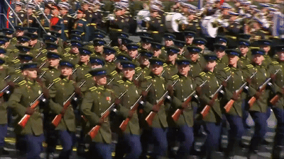 Soldiers Marching in Line with Band