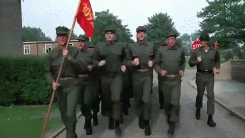 Soldiers Marching With Stop Sign GIF