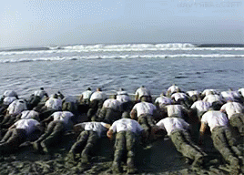 Soldiers Posing For Photo With Woman GIF
